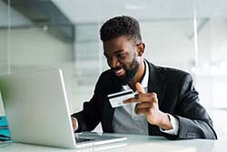 photo of man shopping online